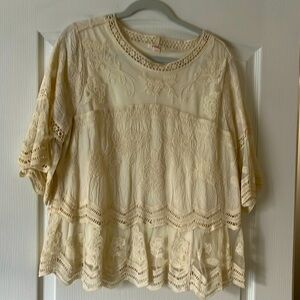 Lace cream top with Bell sleeves.